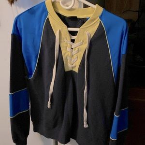 Out from under sweatshirt